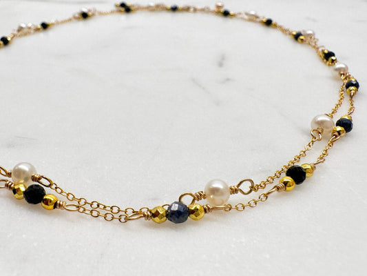 The Anastasia Necklace in Blue Sapphire and White Freshwater Pearl