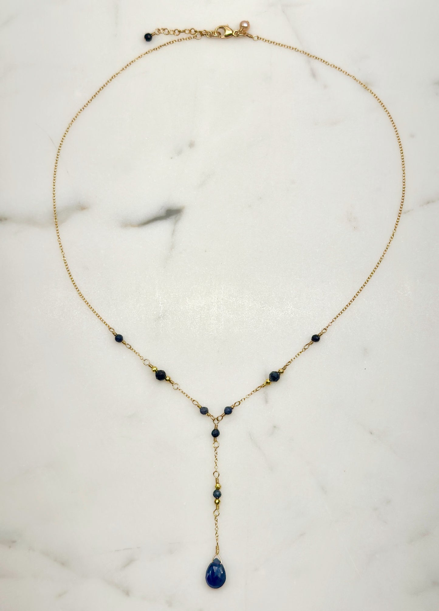 The Lily Necklace in Blue Sapphire