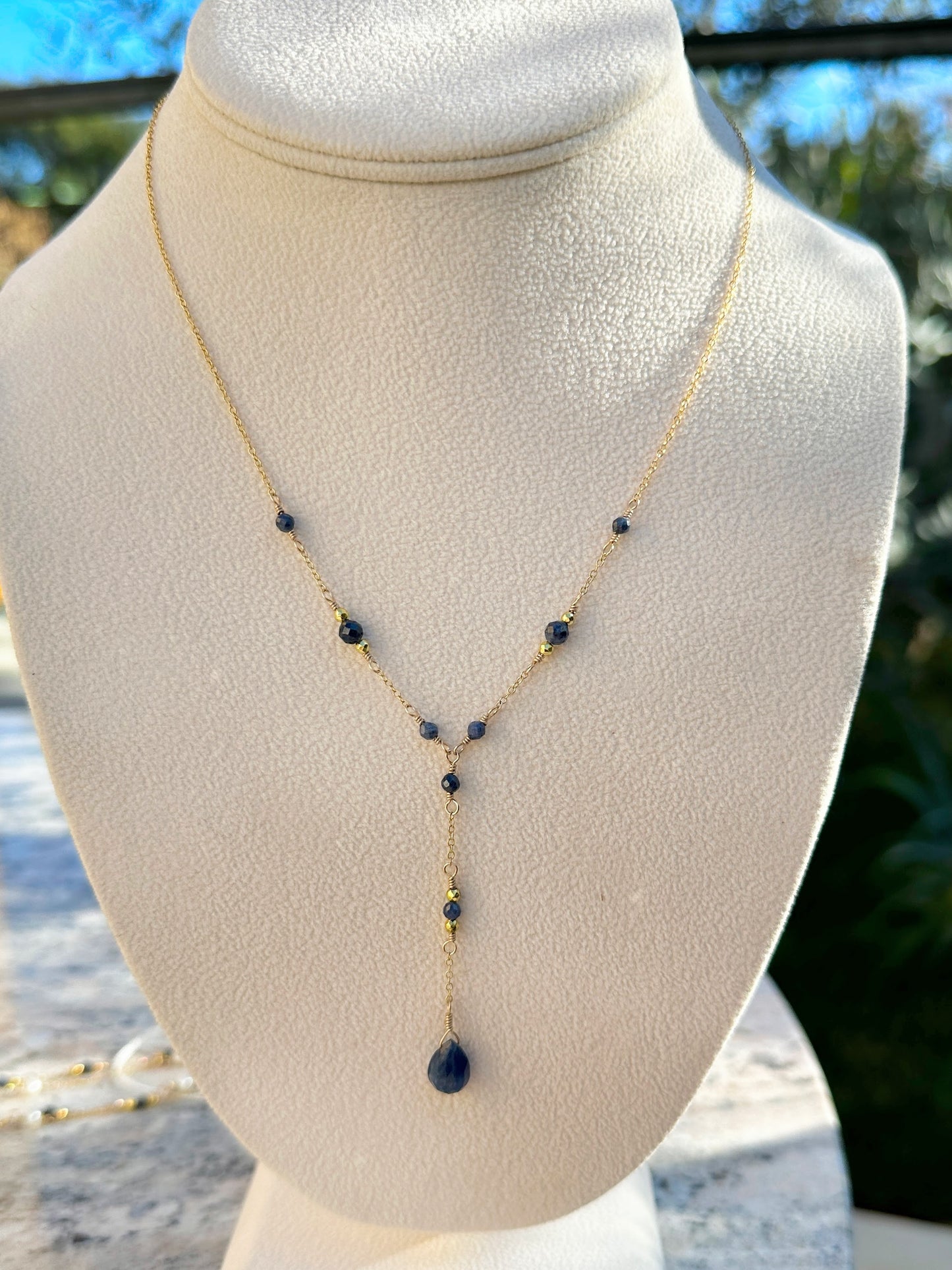 The Lily Necklace in Blue Sapphire